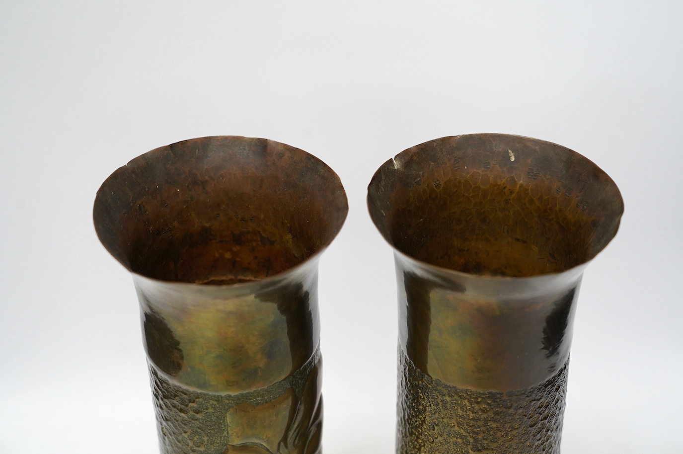 A pair of Trench Art shell case vases, 35cm. Condition - fair